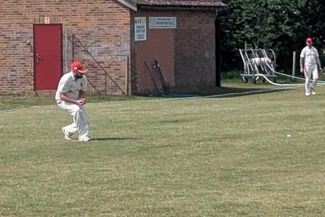 Liam Evans takes a catch in the T20 clash with Lindum.