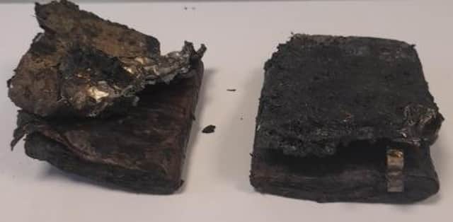 Charred pieces of waste from the bin lorry fire at Newton. Photo: NKDC