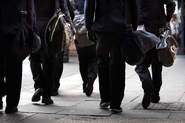 File photo dated 26/01/12 of generic stock picture of pupils. Secondary schools in England will receive £1,000 to help support the Covid-19 vaccination programme. Issue date: Monday January 24, 2022.