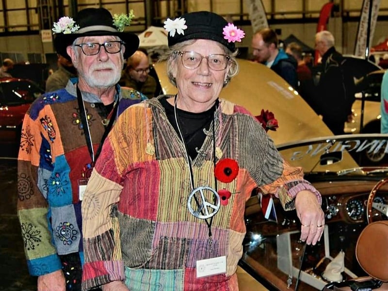 Peter and Jane Hermite alongside their MGB Roadster.