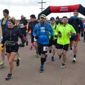 Runners at the start head off down the promenade in Skegness.