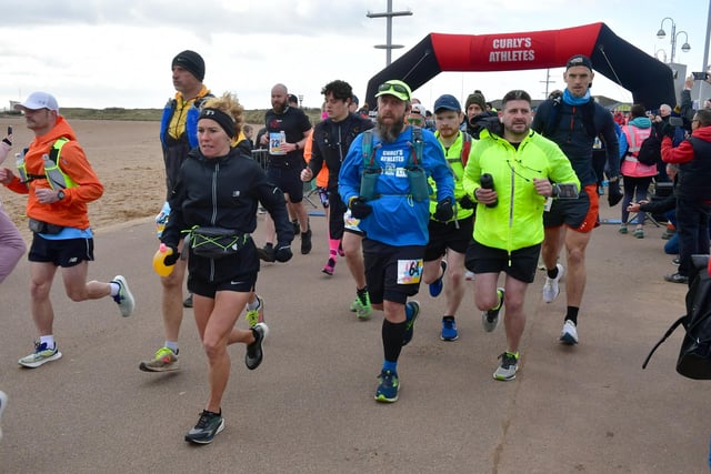 Runners at the start head off down the promenade in Skegness.