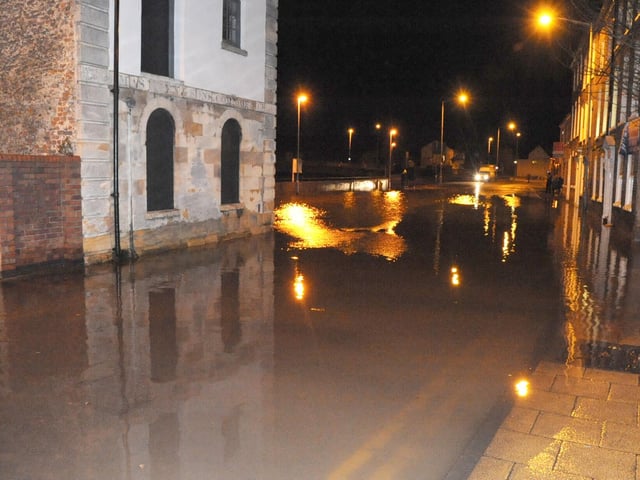 A significant step forward was taken in the Boston Barrier project, 10 years ago. Groundwork investigations had started on the site of the proposed £90 million development. It followed a tidal surge that caused widespread flooding in the town the previous December. Pictured is flooding in High Street the previous December.
