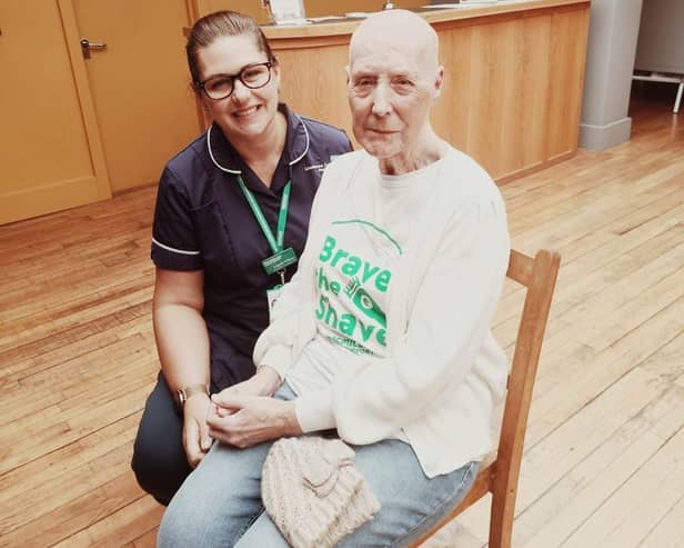 She did it! Maria with a Macmillan nurse who went along to support her.