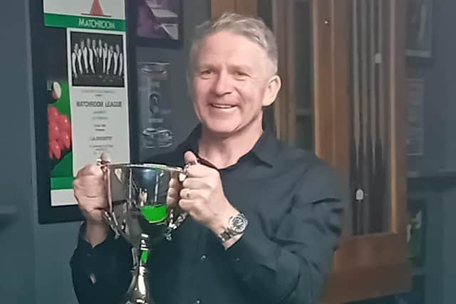 Gary Skipworth proudly shows off the Lincolnshire County Snooker Championship Trophy