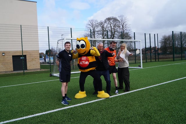 As well as the indoor facilities, the centre has outdoor 3G football pitches. Pictured, from left, are Aron Coy, Bee Active, Bob Tubman (Wolds Wanderers), Coun Stephen Bunney and Sue Tubman (Wolds Wanderers)