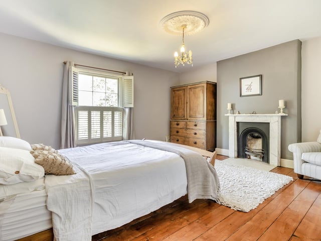 The principal bedroom and ...