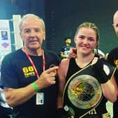 Midlands Box Cup Champion Vienna Barry pictured with coaches Rod Crozier and Dennis Watson.