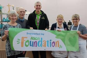 Centenary Methodist Church volunteers and Asda Boston's Stephen Bromby.