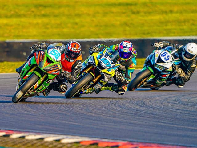 l-r #156 Thomas Kirk, #167 Kyle Jenkins, #55 Stuart Parker in close racing action.