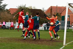 Akeel Francis (no.8) heads home the opening goal. Photo: Steve W Davies Photography.