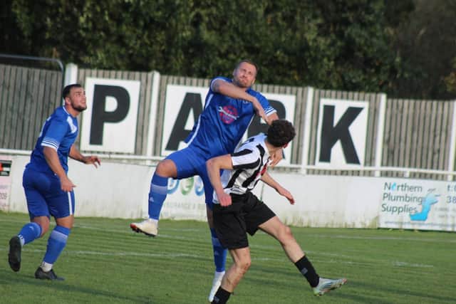 Action from Louth's defeat by Athersley Recreation on Saturday.