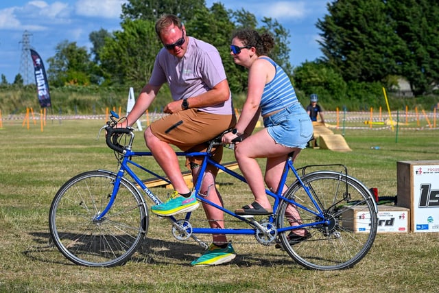 Harry and Sophie aboard a tandem. Photo: Richard Howes Photography