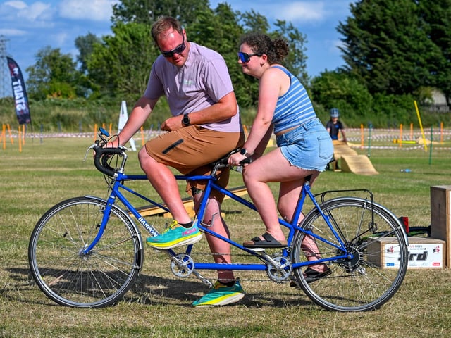 Harry and Sophie aboard a tandem. Photo: Richard Howes Photography