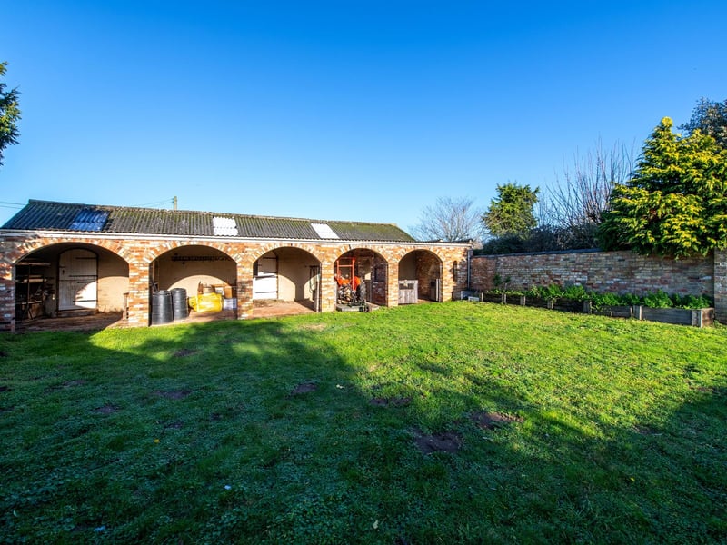 An arched section off the outbuilding.
