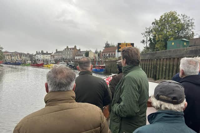 MP for Boston and Skegness Richard Tice (third right) on the Boston Belle heading out to the Boston Barrier