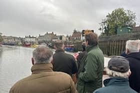 MP for Boston and Skegness Richard Tice (third right) on the Boston Belle heading out to the Boston Barrier