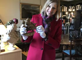 Dr Tracy Borman holding Anne Boleyn's newly-discovered falcon.