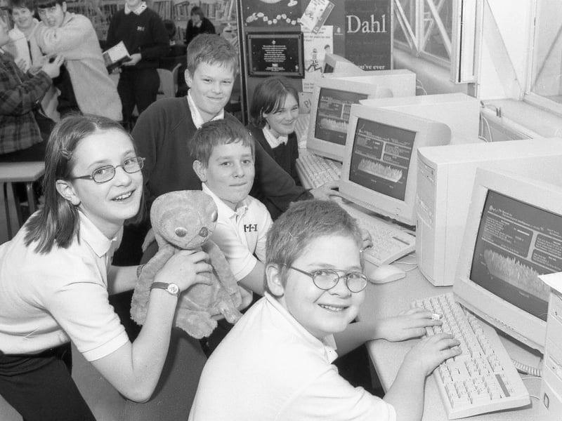 Pupils at Boston's Haven High School looking for evidence of extraterrestrials as part of a science lesson. The school was lending a hand, via the internet, to SETI (Search for Extraterrestrial Intelligence). This involved helping the website analyse radio waves for signs of alien life. Teacher Simon Massey said: "Although SETI is a scientifically advanced organisation, the number of radio frequencies which it scans far exceeds its computer ability to analyse. When our pupils were told that the information the Haven High School was receiving from SETI could, in theory, assist them in their search for a signal from another part of our galaxy, they were extremely excited." E.T. is pictured joining the search.