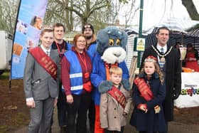 Mayor Coun Adrian Findley (right) with one of the organisers of the Skegness Christmas Market Caroline O'Neill (third left), and Skegness Royalty.