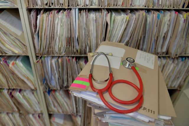 A stethoscope on top of patient's files at the Temple Fortune Health Centre GP Practice near Golders Green, London.