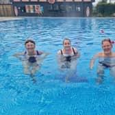 Liz Beckitt, Helen Shaw and Raish Sarin cooling off at Skegness Outdoor Swimming Pool.