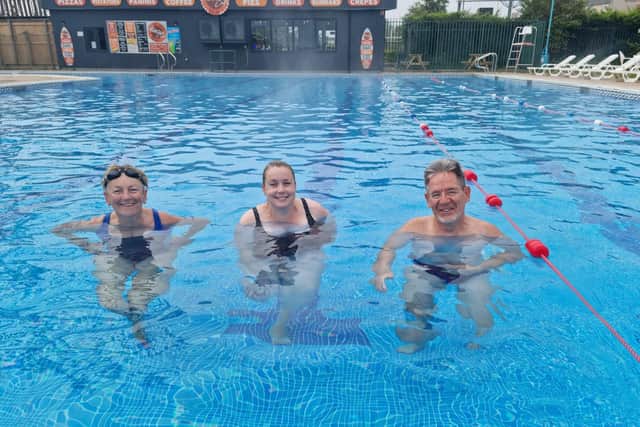 Liz Beckitt, Helen Shaw and Raish Sarin cooling off at Skegness Outdoor Swimming Pool.