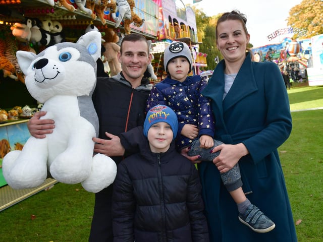 Pictured from left, are Diozis Damme, Maksimillian Gluchovskj, aged nine, Daniel Damme, aged three, and Enelin Lummo, of Boston.