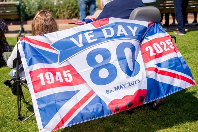 Spectators flying the flag for the Skegness VE/VJ 80 Picnic in the Park.