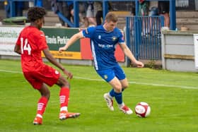 Lewis Butroid on the attack against Barnsley. Photo by Tommy Cox.