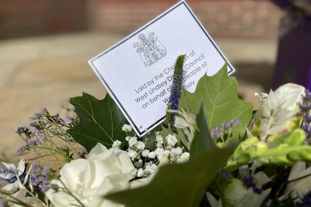 A floral tribute has been laid by the chairman of West Lindsey District Council, Coun Angela Lawrence