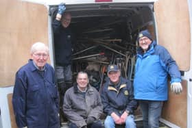 Van full, tired Rotarians