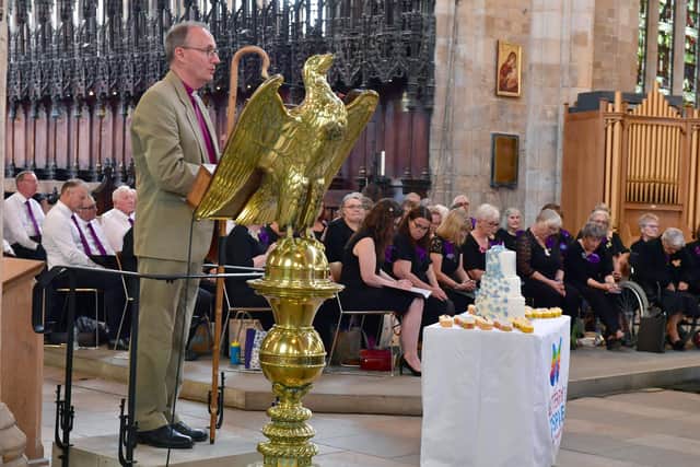 The Bishop of Grantham, The Right Rev Nicholas Chamberlain, helping mark 10 years of the Butterfly Hospice.