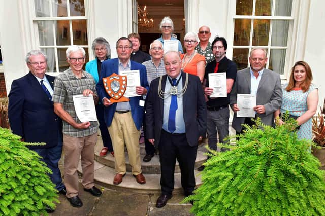 The winners pictured with Boston Preservation Trust members and the Boston Mayor.