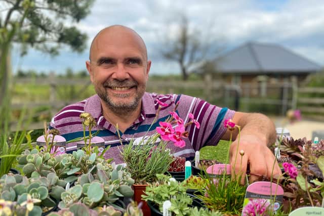 Max Clark from Sturton Plants with some of his Alpine plants. Photo: Chris Frear.