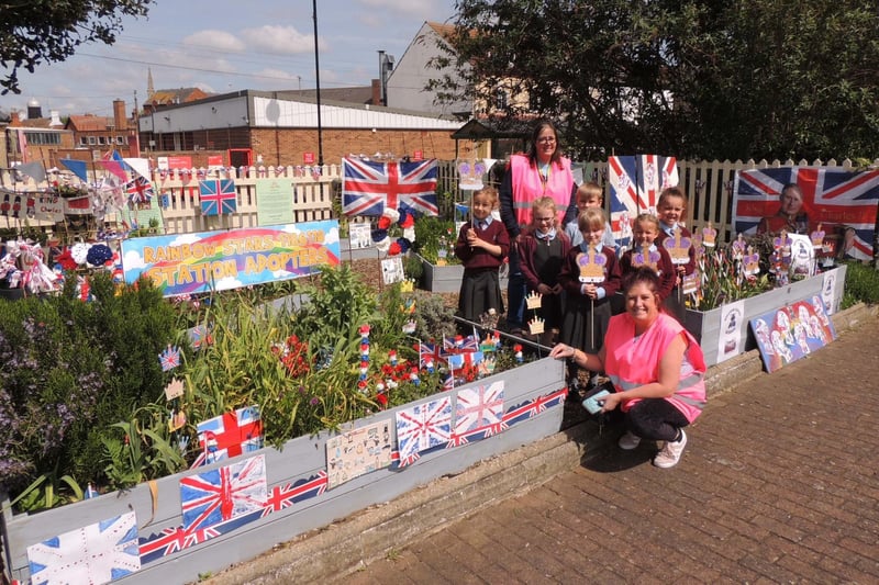 Sleaford area celebrates the King's Coronation.Sam Bryant and Jane Pek from Rainbow Stars hub with the Coronation themed gardens and children from William Alvey School who helped decorate one of the beds. Other groups joined in decorating the raised beds such as the Rotary Club of Sleaford, Sleaford Scouts, Brownies and Guides.