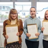 Barnes Wallis Academy pupils receiving their GCSE results.