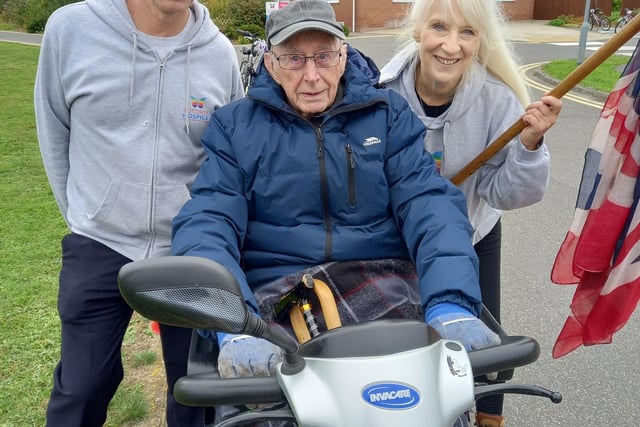 Participant Tony Appleby pictured on his scooter alongside Paul Caddell, hospice therapy services manager, and chief executive Bridget Macpherson. Images supplied