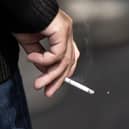 From 1 January 2027, it will become illegal to sell tobacco products to anyone born on or after 1 January 2009. (Photo by Guillaume SALIGOT / AFP via Getty Images)
