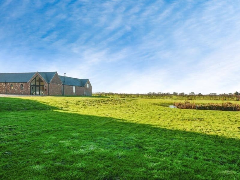 Another view of the property and its grounds.