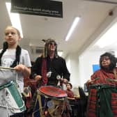 A quiet study area? Not today! Olivia Stevens gets into the drumming workshop with the clansmen drummers.