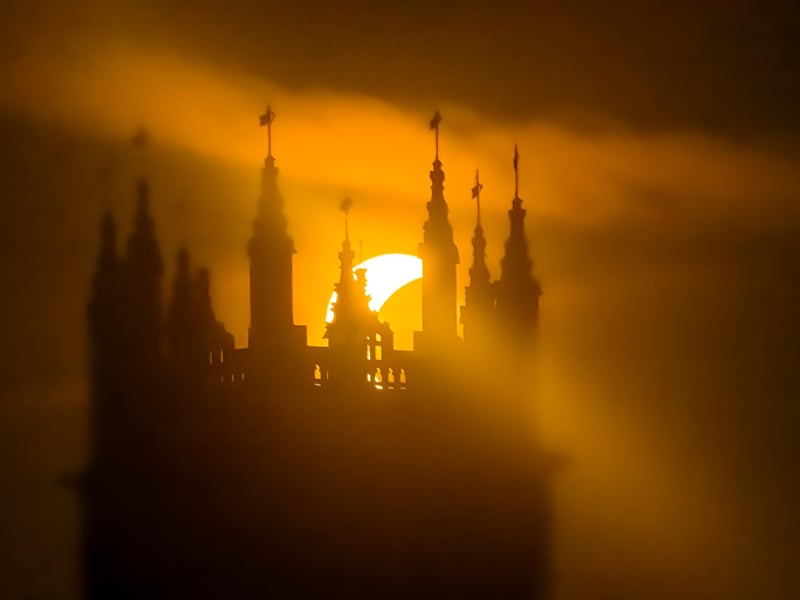 The eclipse makes 'contact' with the top of St Botolph's Church.