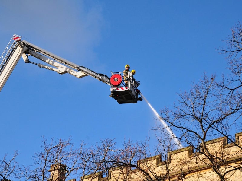 Firefighters damping down this morning. Photo: Roderick Carlyle