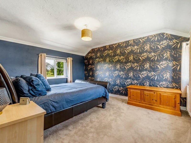 One of the five double bedrooms.