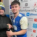Man of the match Zane Millar and matchday sponsor from Lincolnshire Non-League Radio Darren Trapps.