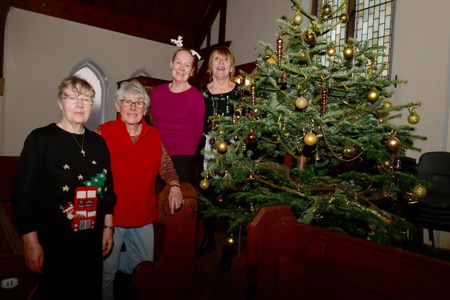 Some of our amazing team at Waiunfleet Methodist Church (from left) Sue Alldread, Jan Ward, Leone Harding and Carole Harbon,  with the Christmas tree donated by Bells Nursery.