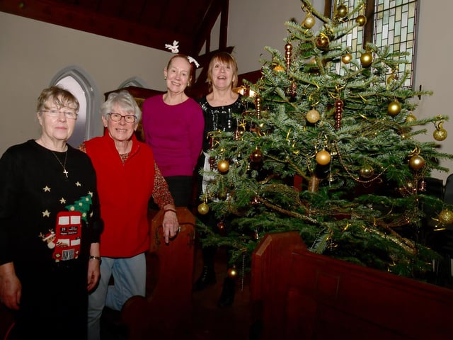 Some of our amazing team at Waiunfleet Methodist Church (from left) Sue Alldread, Jan Ward, Leone Harding and Carole Harbon,  with the Christmas tree donated by Bells Nursery.