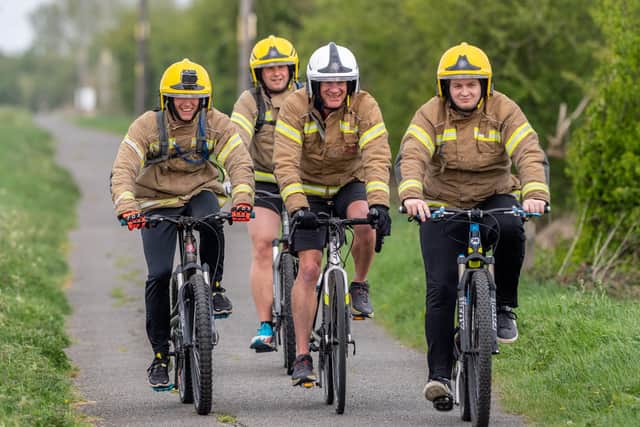 The firefighters cycling to Bardney.