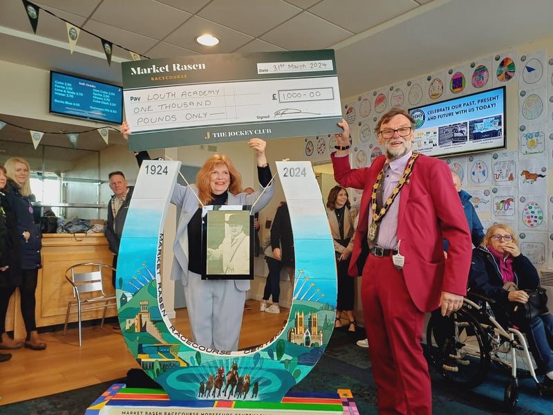 Louth Academy won the secondary school Horseshoe Competition. Louth Mayor Julia Simmons collected the school's £1,000 prize from Coun Stephen Bunney, Chairman of West Lindsey District Council