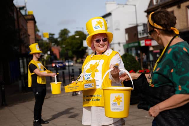 Volunteers raise funds for The Great Daffodil Appeal.